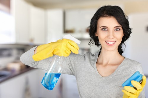 Local carpet cleaner in Merton treating a hallway carpet