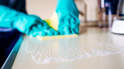 Deep carpet cleaning equipment used on a hallway carpet
